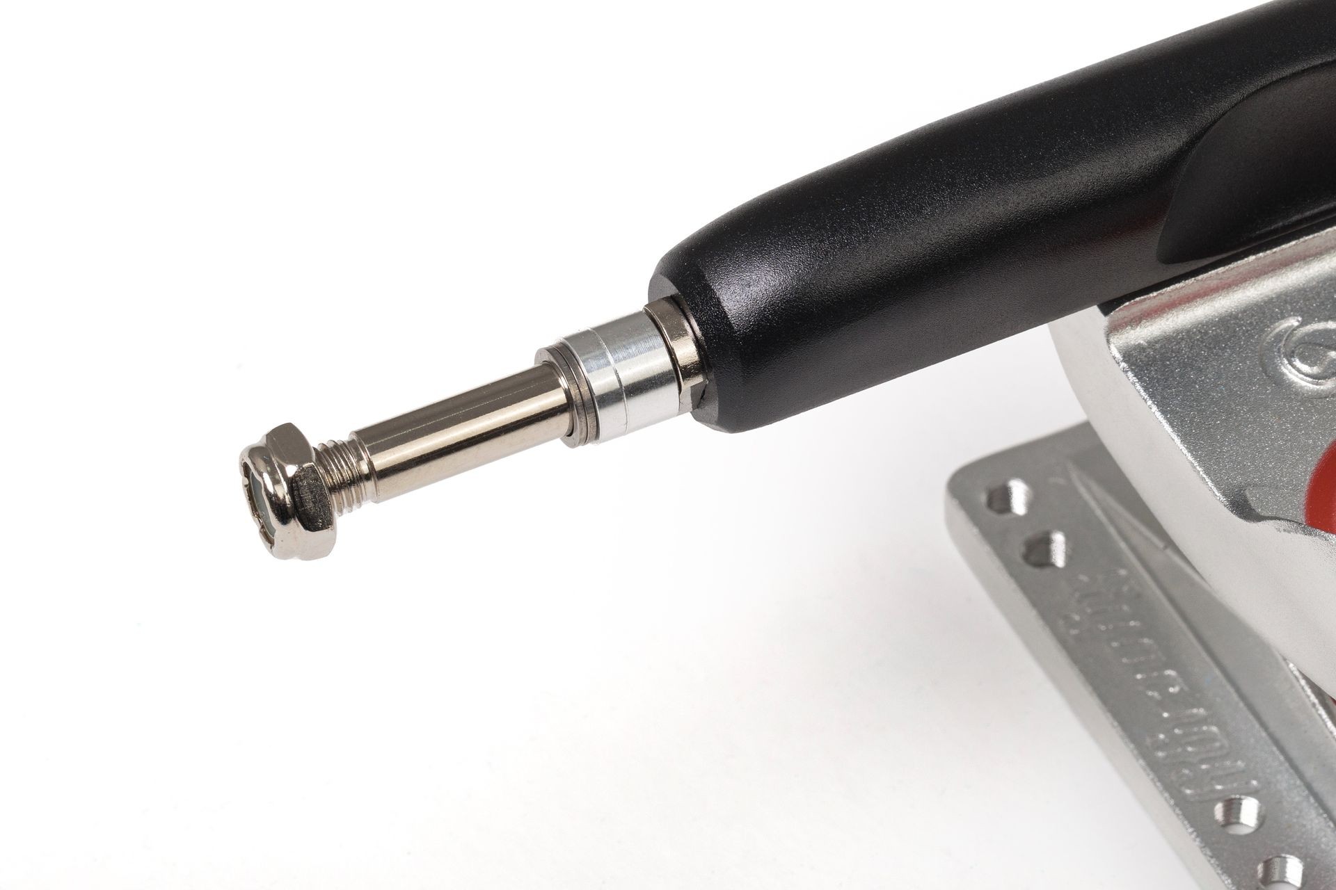 Close-up of a mounting bracket with a lever and adjustable screw on a white background.